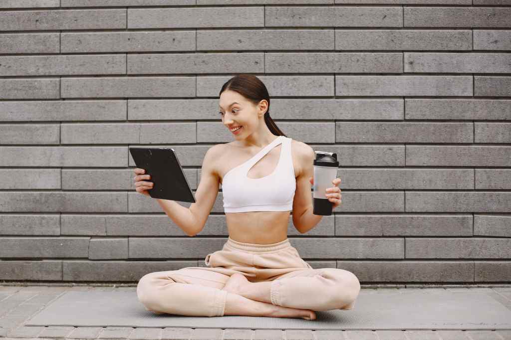 Woman practicing meditation using an app